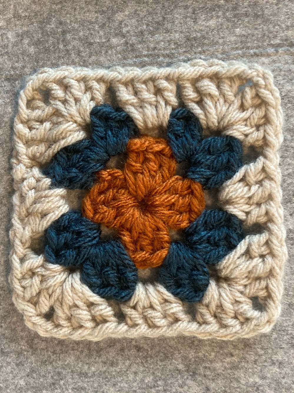 Granny Square in teal, rust, and cream